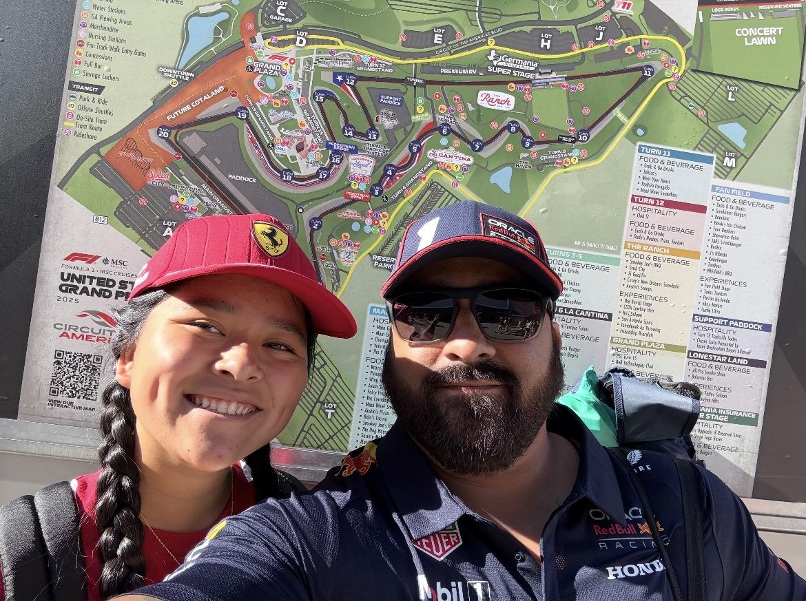 Sergio Torre with his daughter at a race